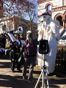 Street theater: face off between a banker and a polar bear