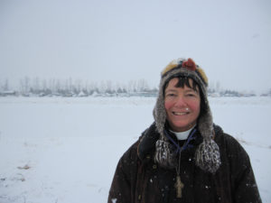 Standing at the edge of Oceti Sakowin Camp on Monday, 12/5/16, as a blizzard began to blow in. Beyond the river behind me are Rosebud Camp and Sacred Stone Camp.