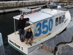 Ken Ward (left) and Jay O’Hara on the boat they used to block the delivery of 40,000 tons of coal to a power plant in Somerset. Photo © Ben Thompson