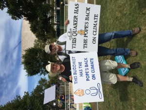 Doug Hendren and Dave Pruett express the spirit of the climate rally on the National Mall