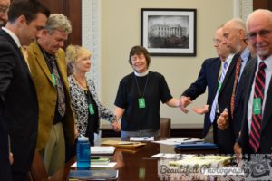 Praying with members of National Religious Coalition on Creation Care and of White House Council on Environmental Quality. Photo credit: Beautifell Photography by Christine Ellman